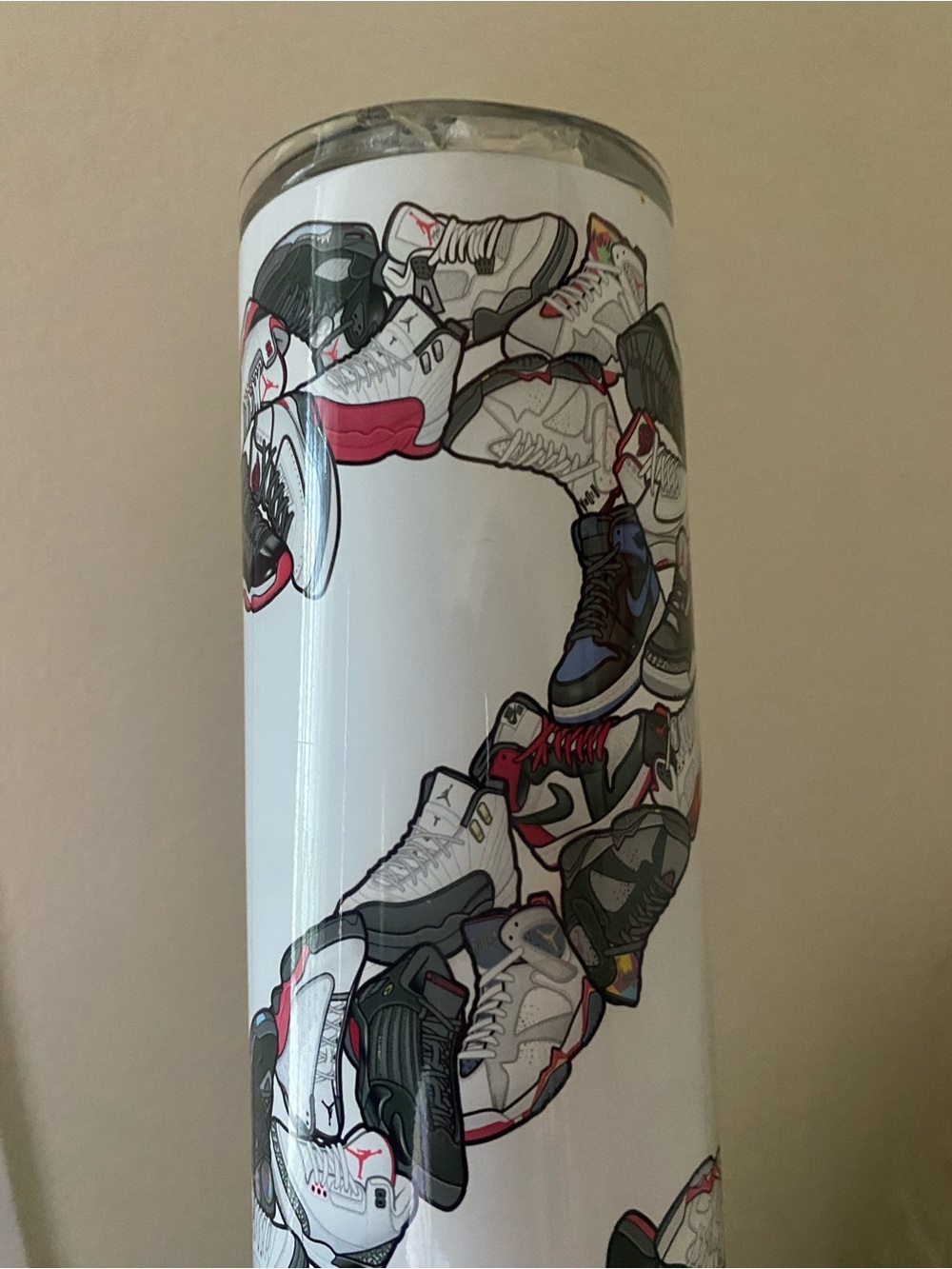 Sneaker Waterbottle - White with Multicolor Shoe Print and Connected Speaker